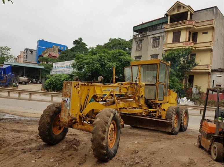 Máy san gạt komatsu